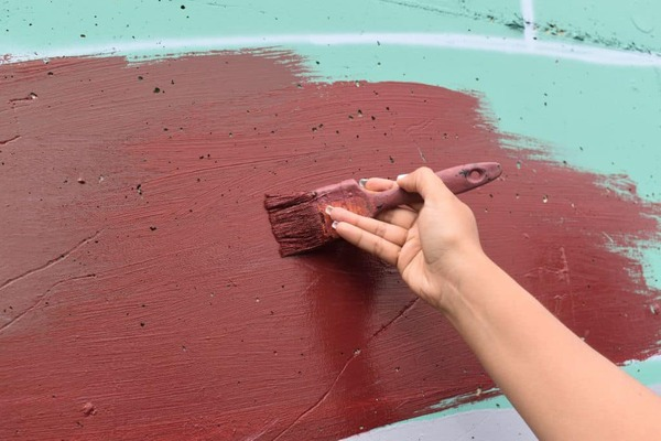 pintando_mural_Poder_joven